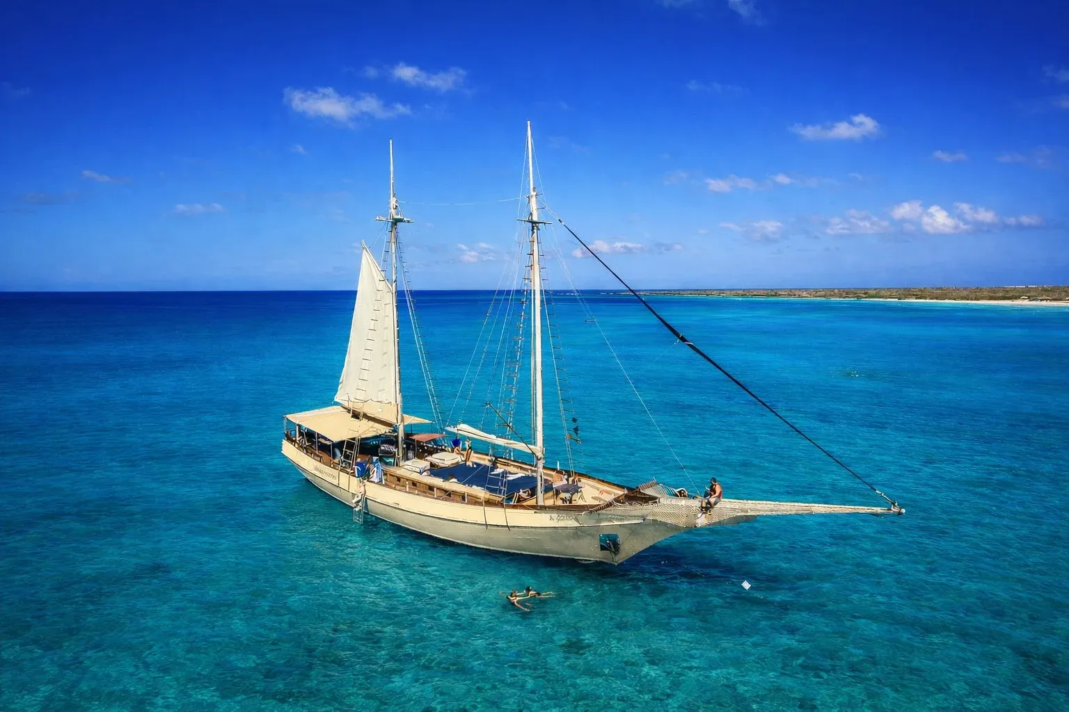 Flagship Aruba schooner anchored in the shallows